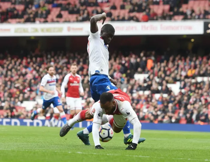 Framed Print : Controversial Penalty: Lacazette Tripped by Ndiaye in Arsenal's Win over Stoke City Framed Print : Controversial Penalty: Lacazette Tripped by Ndiaye in Arsenal's Win over Stoke City