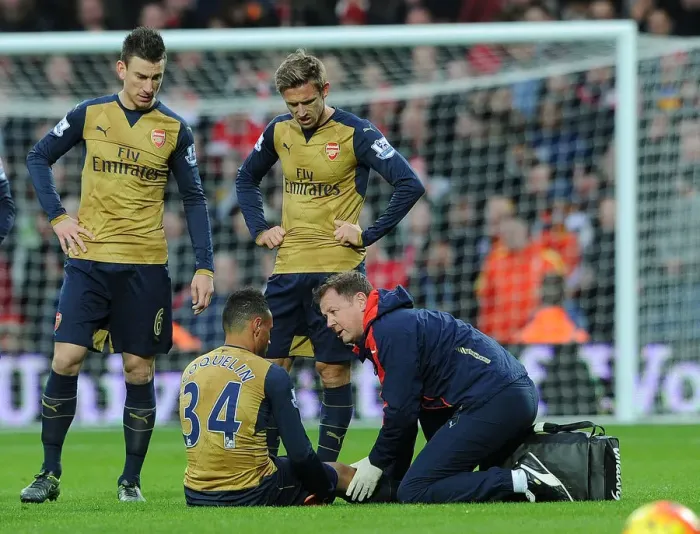 Framed Print : Coquelin Receives Medical Attention During Arsenal's Match against West Bromwich Albion (2015-16)