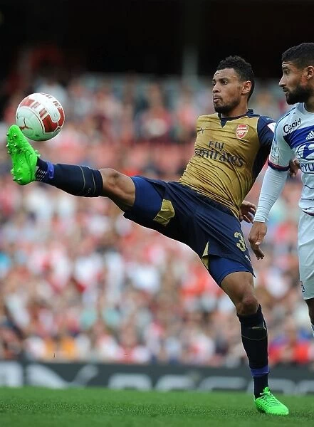 Coquelin Stands Firm Against Olympique Lyonnais at Emirates Cup