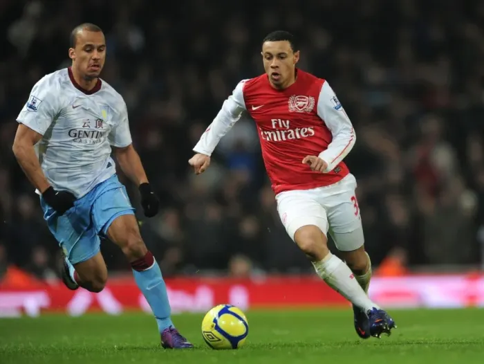 Framed Print : Coquelin vs. Agbonlahor: A Midfield Battle of Intensity in Arsenal's FA Cup Clash against Aston Villa