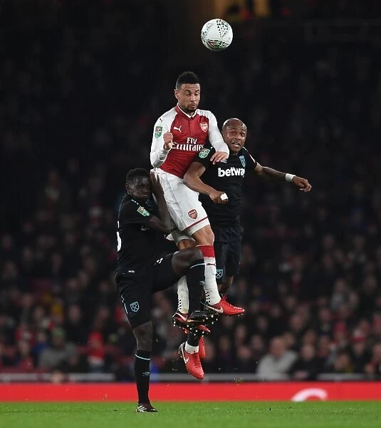 Coquelin vs. Ayew and Quina: A Headed Battle in the Carabao Cup Clash between Arsenal and West Ham