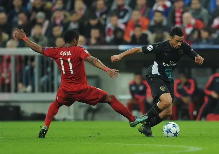 Framed Print : Coquelin vs Costa: A Footballing Battle in the Bayern Munich vs Arsenal UEFA Champions League Clash Framed Print : Coquelin vs Costa: A Footballing Battle in the Bayern Munich vs Arsenal UEFA Champions League Clash