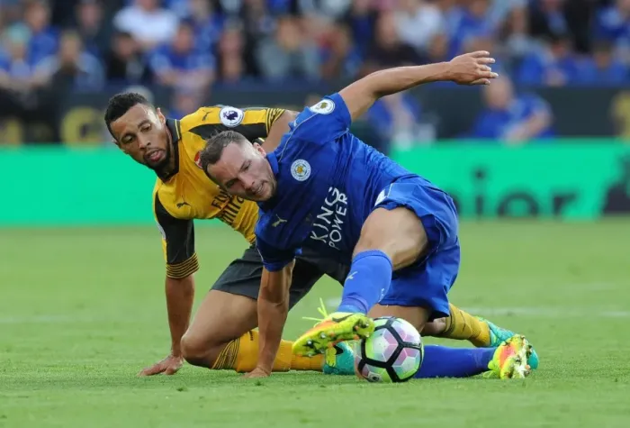 Framed Print : Coquelin vs. Drinkwater: A Premier League Showdown at The King Power Stadium Framed Print : Coquelin vs. Drinkwater: A Premier League Showdown at The King Power Stadium