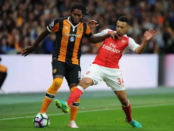 Framed Print : Coquelin vs Mbokani: A Premier League Battle at Hull City