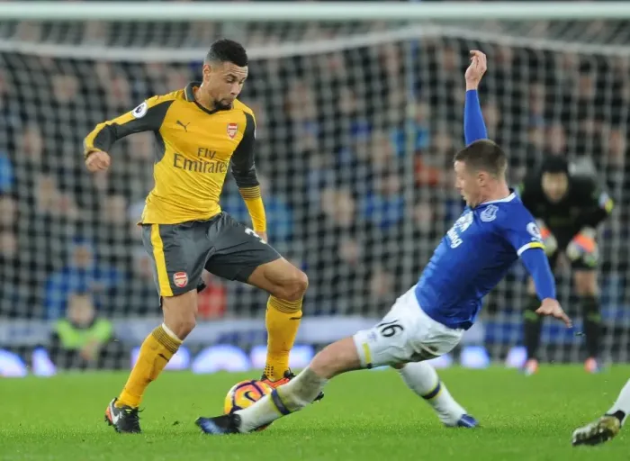Framed Print : Coquelin vs McCarthy: A Premier League Battle at Goodison Park