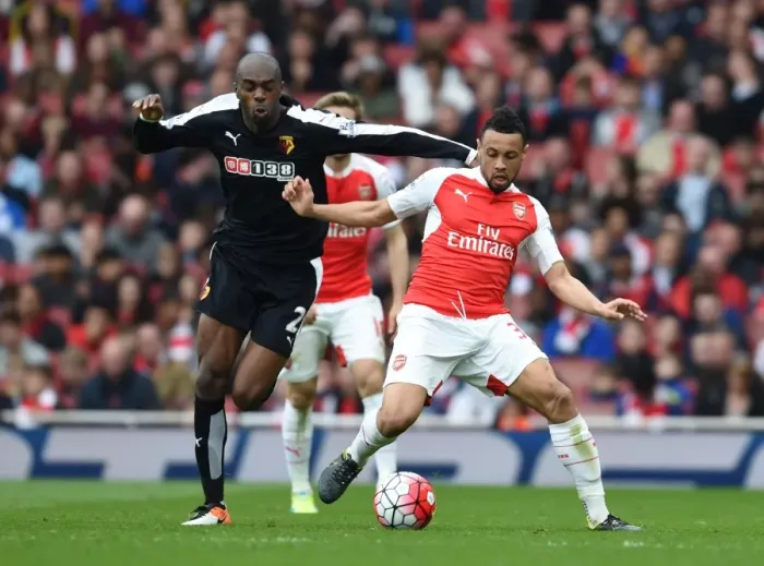 Framed Print : Coquelin vs. Nyom: A Premier League Battle - Arsenal vs. Watford