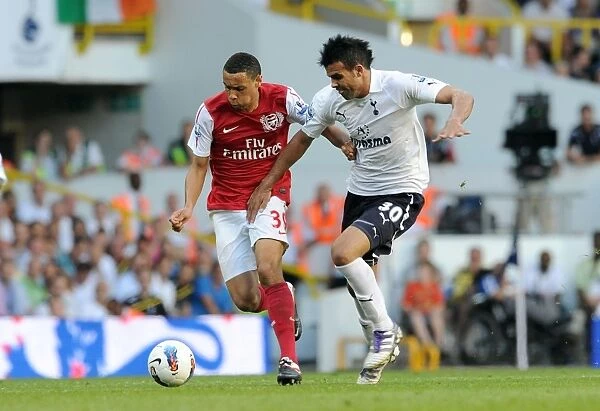 Coquelin vs. Sandro: A Pivotal Battle - Tottenham Hotspur's 2-1 Victory over Arsenal in the Premier League (2011-12)