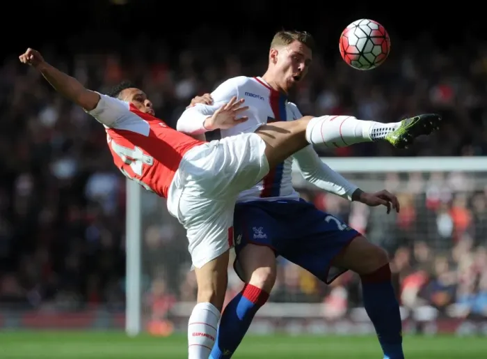 Framed Print : Coquelin vs Wickham: A Premier League Battle at Emirates Stadium Framed Print : Coquelin vs Wickham: A Premier League Battle at Emirates Stadium