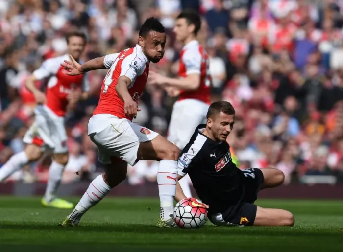 Framed Print : Coquelin's Dominant Display: Overpowering Abdi in Arsenal's Premier League Battle Framed Print : Coquelin's Dominant Display: Overpowering Abdi in Arsenal's Premier League Battle