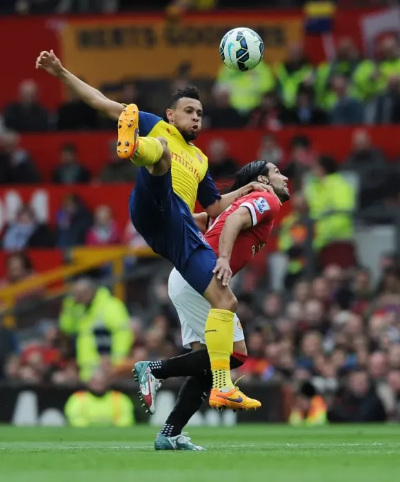 Framed Print : Coquelin's Triumph: Soaring Over Falcao in the Manchester Derby, Premier League 2014-15