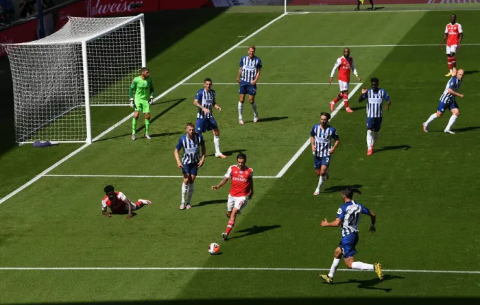 Framed Print : Dani Ceballos Chases Down Loose Ball: Brighton & Hove Albion vs. Arsenal FC, Premier League 2019-2020