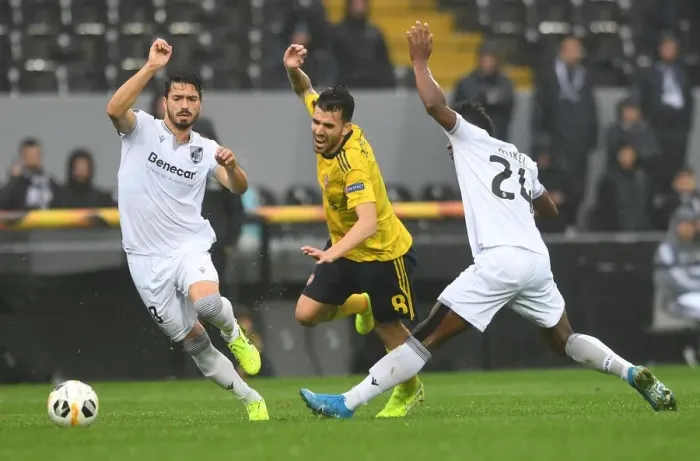Framed Print : Dani Ceballos Clashes with Pepe and Mikel Agu during Arsenal's UEFA Europa League Match against Vitoria Guimaraes