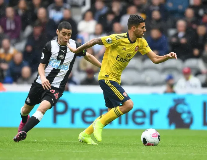 Framed Print : Dani Ceballos vs Miquel Almiron: Battle in the Premier League - Newcastle United vs Arsenal FC (2019-20)