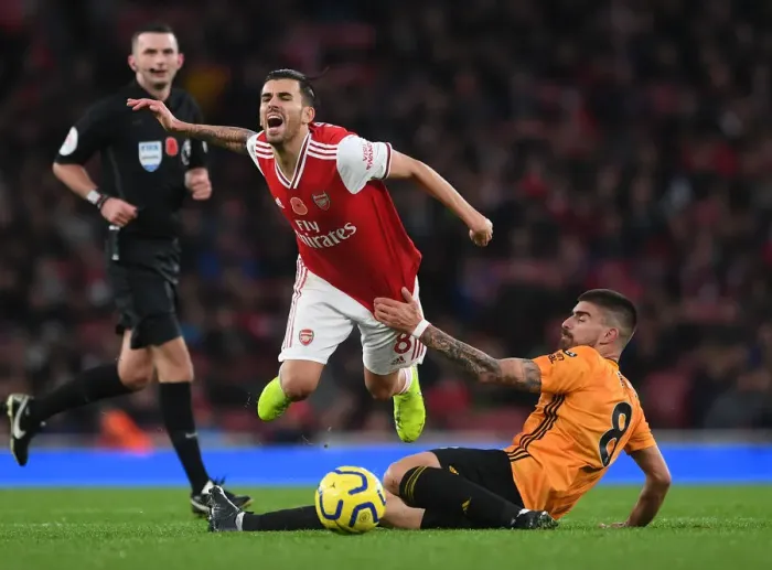 Framed Print : Dani Ceballos vs. Ruben Neves: A Premier League Showdown at Emirates Stadium