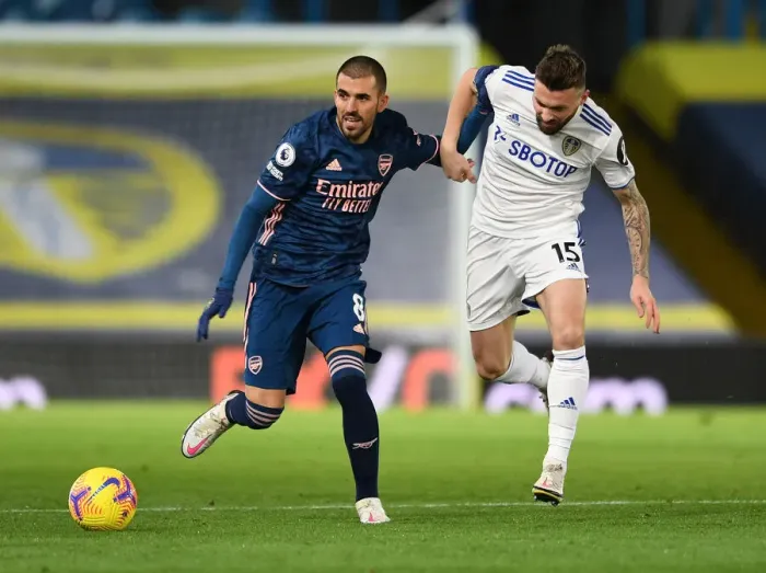 Framed Print : Dani Ceballos vs Stuart Dallas: Clash of the Midfielders - Leeds United vs Arsenal, Premier League 2020-21