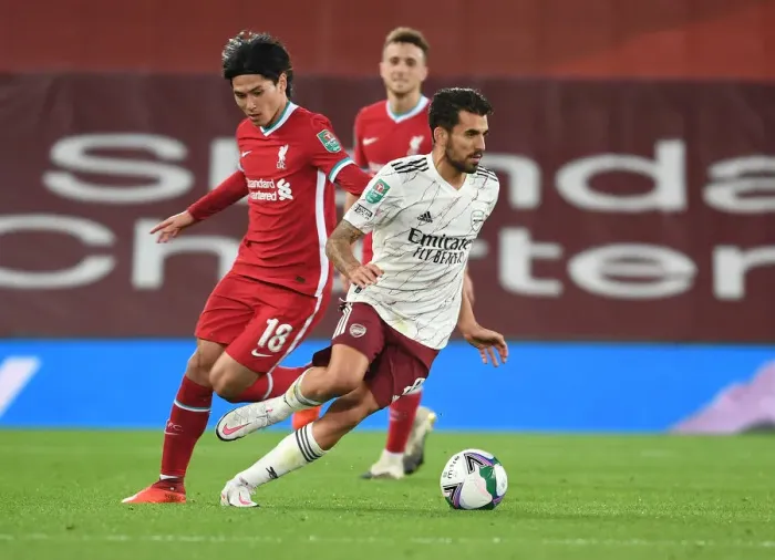 Framed Print : Dani Ceballos vs. Takumi Minamino: Empty Anfield Rivals in Carabao Cup Clash