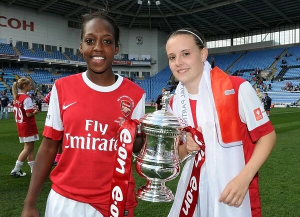 Danielle Carter and Lauren Bruton (Arsenal) with the FA Cup Trophy. Arsenal Ladies 2