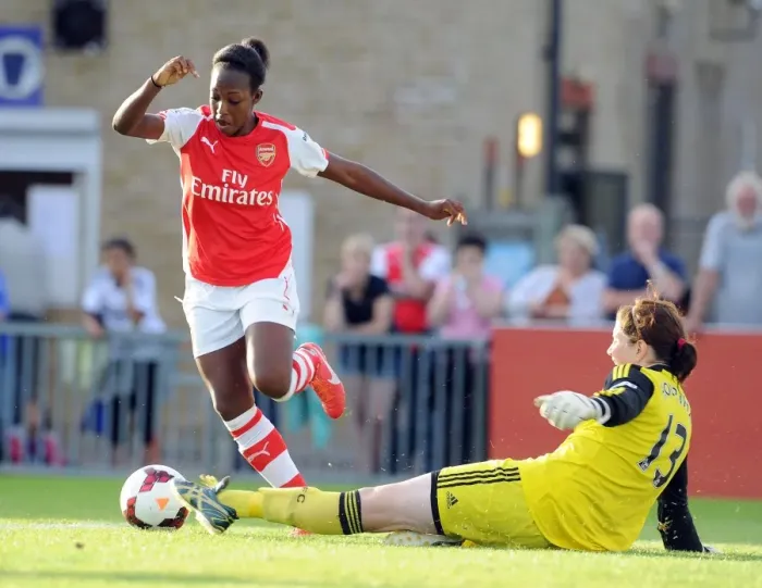Framed Print : Danielle Carter Outmaneuvers Marie Hourihan: Chelsea Ladies vs. Arsenal Ladies WSL Showdown
