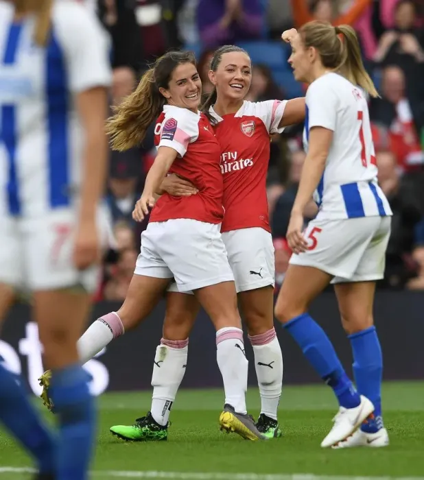 Framed Print : Danielle van de Donk and Katie McCabe Celebrate Arsenal's Fourth Goal Against Brighton & Hove Albion Women