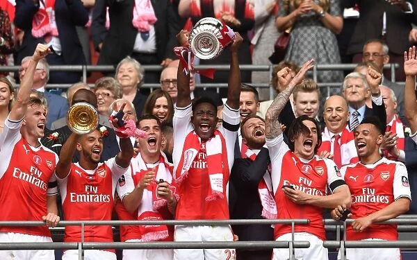 Danny Welbeck Celebrates Arsenal's FA Cup Victory: Lifting the Trophy after Arsenal vs. Chelsea (2017)