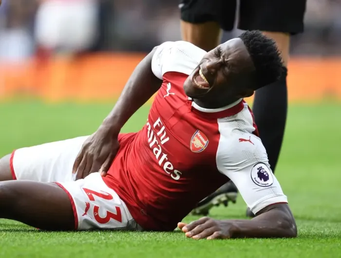 Framed Print : Danny Welbeck Injured: Chelsea vs Arsenal, Premier League 2017-18