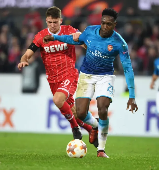 Framed Print : Danny Welbeck Outmaneuvers Salin Ozcan in Arsenal's UEFA Europa League Clash with 1. FC Koln Framed Print : Danny Welbeck Outmaneuvers Salin Ozcan in Arsenal's UEFA Europa League Clash with 1. FC Koln