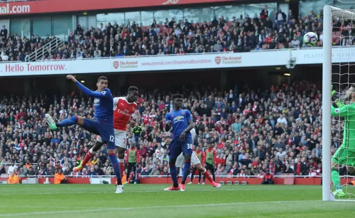 Framed Print : Danny Welbeck Scores Dramatic Goal Past Chris Smalling: Arsenal vs Manchester United, Premier League 2016-17 Framed Print : Danny Welbeck Scores Dramatic Goal Past Chris Smalling: Arsenal vs Manchester United, Premier League 2016-17
