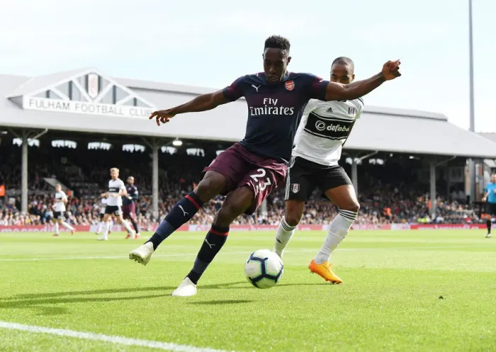 Framed Print : Danny Welbeck vs Denis Odoi: Battle at Craven Cottage - Fulham vs Arsenal, Premier League 2018-19