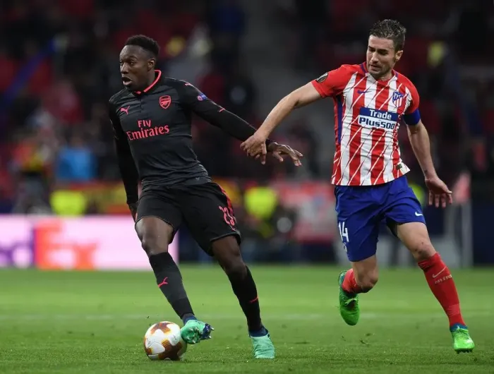 Framed Print : Danny Welbeck vs. Gabi: A Battle in the Arsenal-Atletico Madrid UEFA Europa League Semi-Final