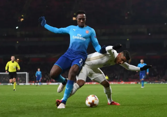 Framed Print : Danny Welbeck vs. Hosam Aiesh: Arsenal's Battle in Europa League Against Östersunds Framed Print : Danny Welbeck vs. Hosam Aiesh: Arsenal's Battle in Europa League Against Östersunds