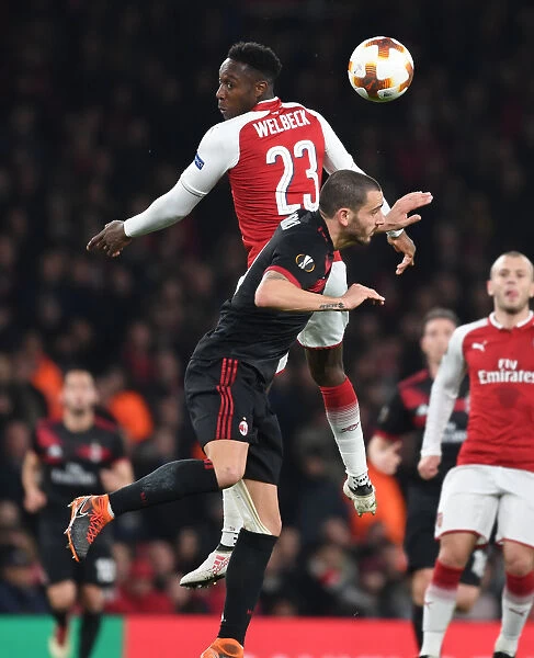 Danny Welbeck vs. Leonardo Bonucci: Aerial Battle in Arsenal's Europa League Clash Against AC Milan