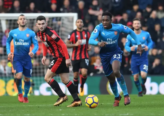 Framed Print : Danny Welbeck vs. Lewis Cook: Intense Battle in AFC Bournemouth vs. Arsenal Premier League Clash