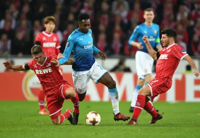 Framed Print : Danny Welbeck vs. Milos Mere: Clash in the UEFA Europa League between Arsenal and 1. FC Koln Framed Print : Danny Welbeck vs. Milos Mere: Clash in the UEFA Europa League between Arsenal and 1. FC Koln