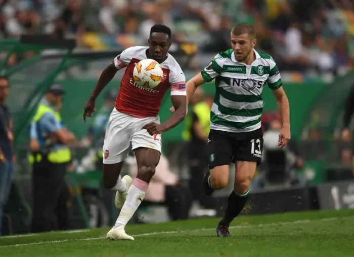 Framed Print : Danny Welbeck vs. Radosav Petrovic: Clash in the Europa League between Sporting CP and Arsenal Framed Print : Danny Welbeck vs. Radosav Petrovic: Clash in the Europa League between Sporting CP and Arsenal