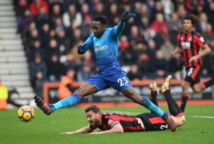Framed Print : Danny Welbeck vs. Simon Francis: Intense Moment at the Vitality Stadium Framed Print : Danny Welbeck vs. Simon Francis: Intense Moment at the Vitality Stadium