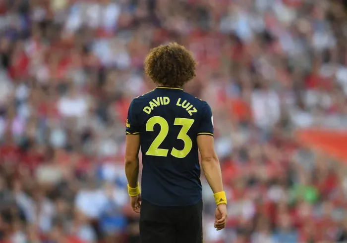 Framed Print : David Luiz Faces Off Against Liverpool in Premier League Clash (2019-20) Framed Print : David Luiz Faces Off Against Liverpool in Premier League Clash (2019-20)