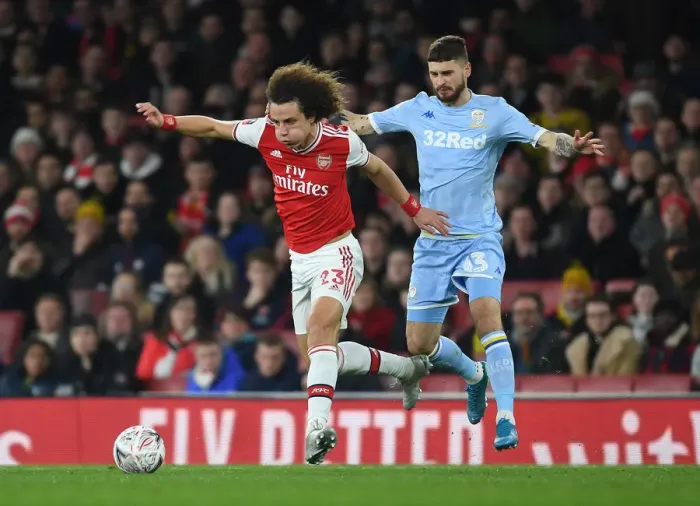 Framed Print : David Luiz: Unwavering Concentration in Arsenal's FA Cup Battle against Leeds United Framed Print : David Luiz: Unwavering Concentration in Arsenal's FA Cup Battle against Leeds United
