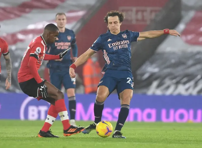 Framed Print : David Luiz vs Ibrahima Diallo: A Battle in Empty St. Mary's Stadium - Premier League 2021: Southampton vs Arsenal