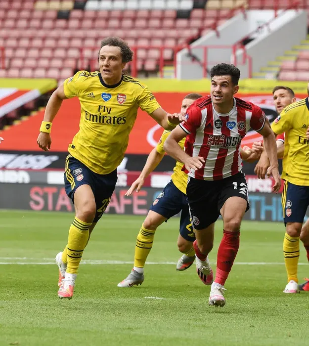 Framed Print : David Luiz vs John Egan: Clash of the Captains in FA Cup Quarterfinal Between Sheffield United and Arsenal