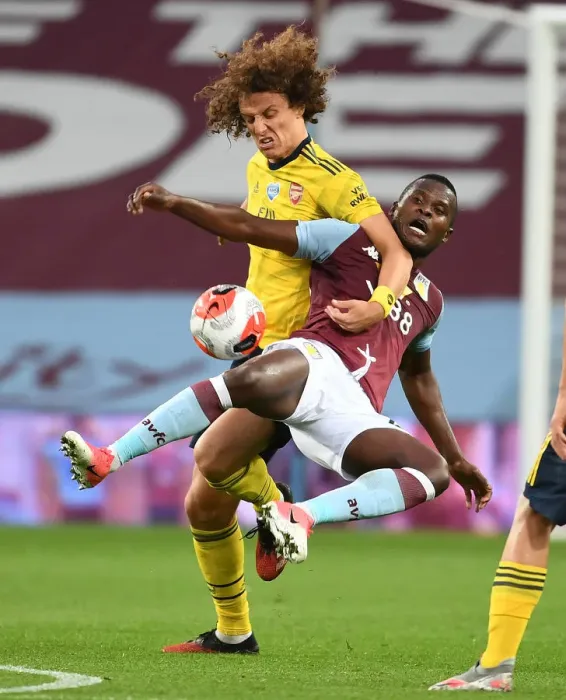 Framed Print : David Luiz vs. Mbwana Samatta: Intense Clash in Aston Villa vs. Arsenal FC Premier League Match Framed Print : David Luiz vs. Mbwana Samatta: Intense Clash in Aston Villa vs. Arsenal FC Premier League Match