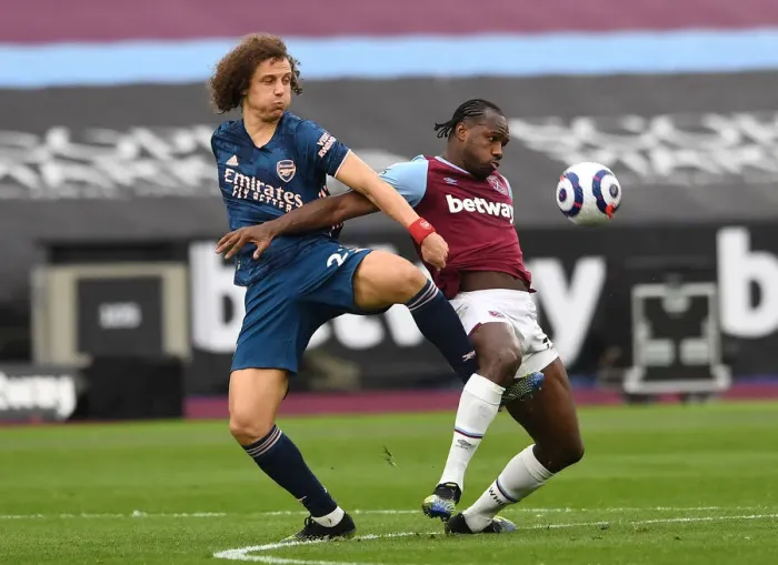 Framed Print : David Luiz vs Michail Antonio: A Battle of Strength in the Intense West Ham United vs Arsenal Premier League Clash Framed Print : David Luiz vs Michail Antonio: A Battle of Strength in the Intense West Ham United vs Arsenal Premier League Clash