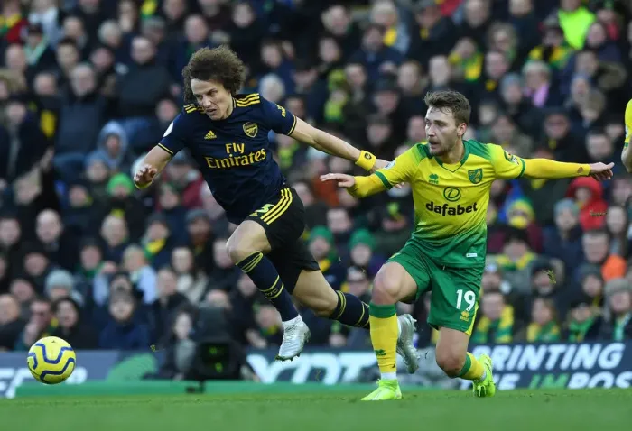 Framed Print : David Luiz vs. Tom Trybull: Clash in the Premier League between Norwich City and Arsenal FC