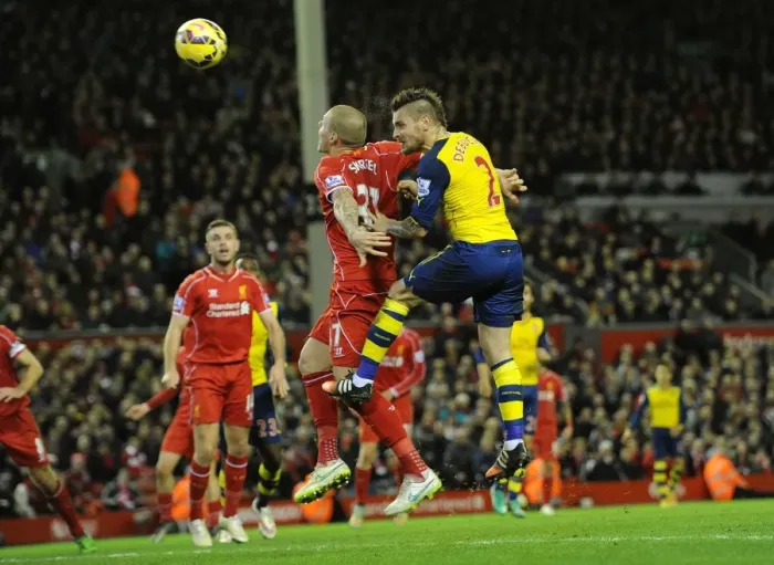 Framed Print : Debuchy Strikes: Dramatic Moment Arsenal's Mathieu Debuchy Scores Past Liverpool's Martin Skrtel (2014 / 15)