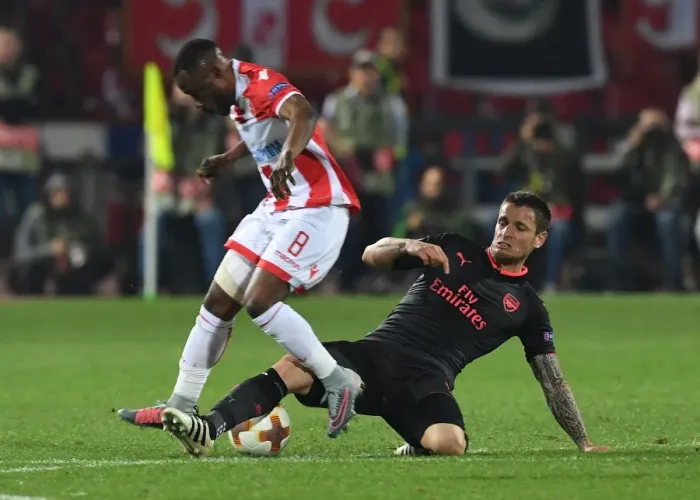 Framed Print : Debuchy vs Kanga: Clash in the Europa League Between Red Star and Arsenal