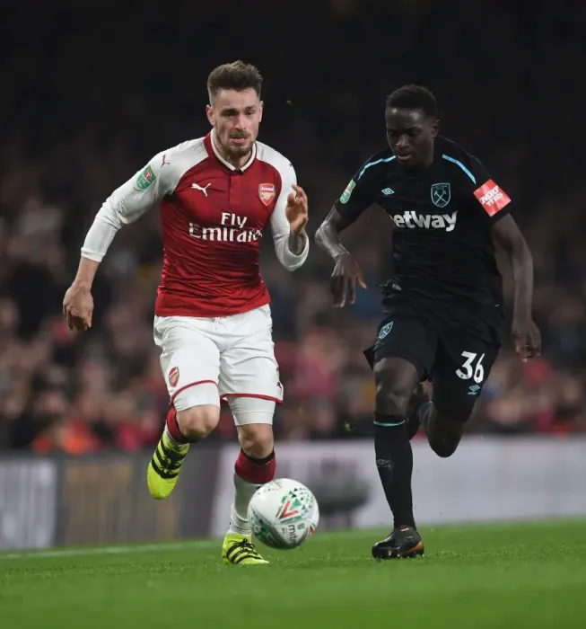 Framed Print : Debuchy vs. Quina: A Carabao Cup Showdown at Emirates Stadium