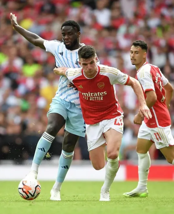 Framed Print : Declan Rice vs. Orel Mangala: Intense Clash in Arsenal's 2023-24 Premier League Opener against Nottingham Forest Framed Print : Declan Rice vs. Orel Mangala: Intense Clash in Arsenal's 2023-24 Premier League Opener against Nottingham Forest