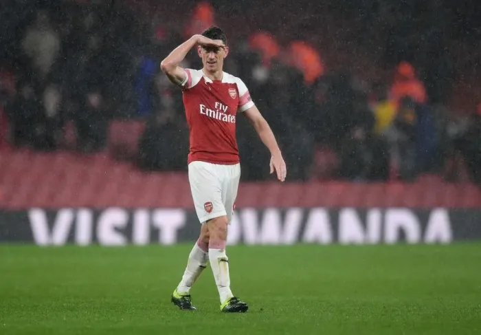 Framed Print : Defiant Koscielny: Arsenal's Iconic Stand Against Manchester United (2018-19)
