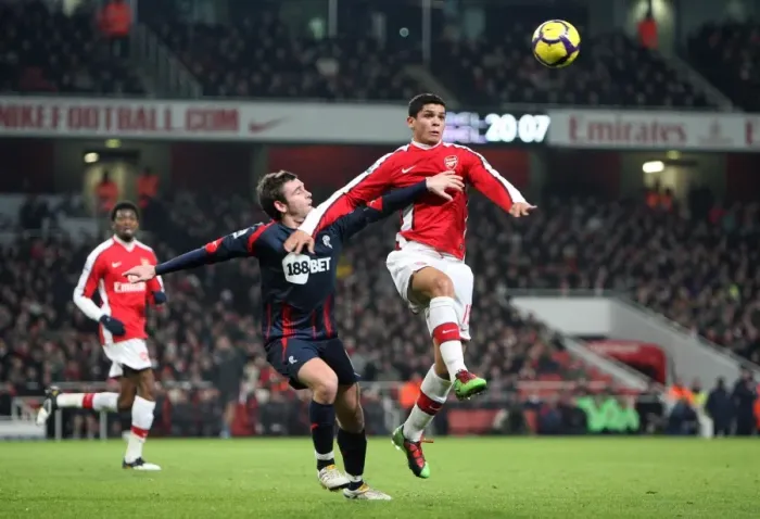 Framed Print : Denilson (Arsenal) Mark Davies (Bolton). Arsenal 4: 2 Bolton Wanderers. Barclays Premier League