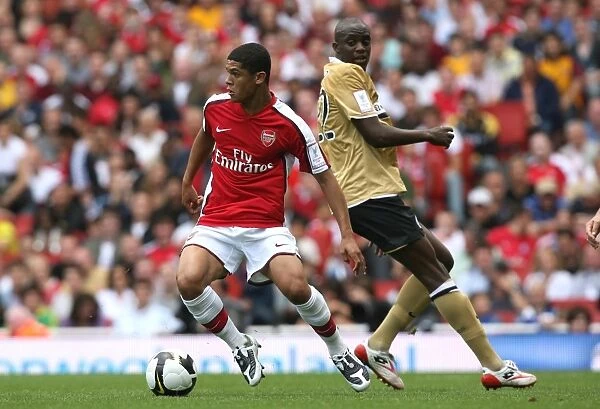 Denilson (Arsenal) Mohamed Sissoko (Juventus)