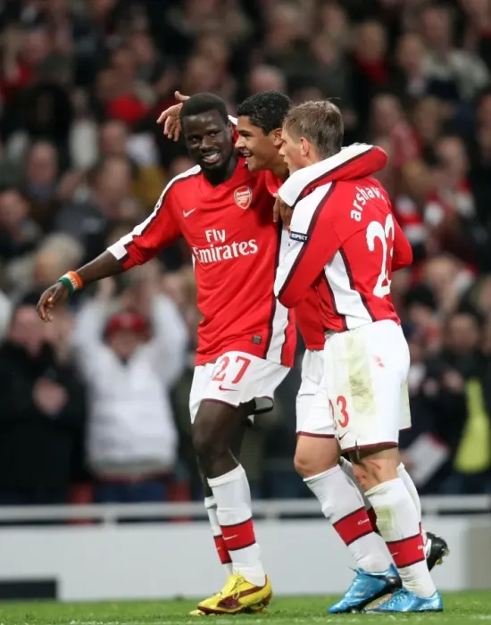 Framed Print : Denilson, Eboue, and Arshavin: Arsenal's Unforgettable Duo Goal Celebration in Champions League Victory (2:0 vs Standard Liege, 2009)